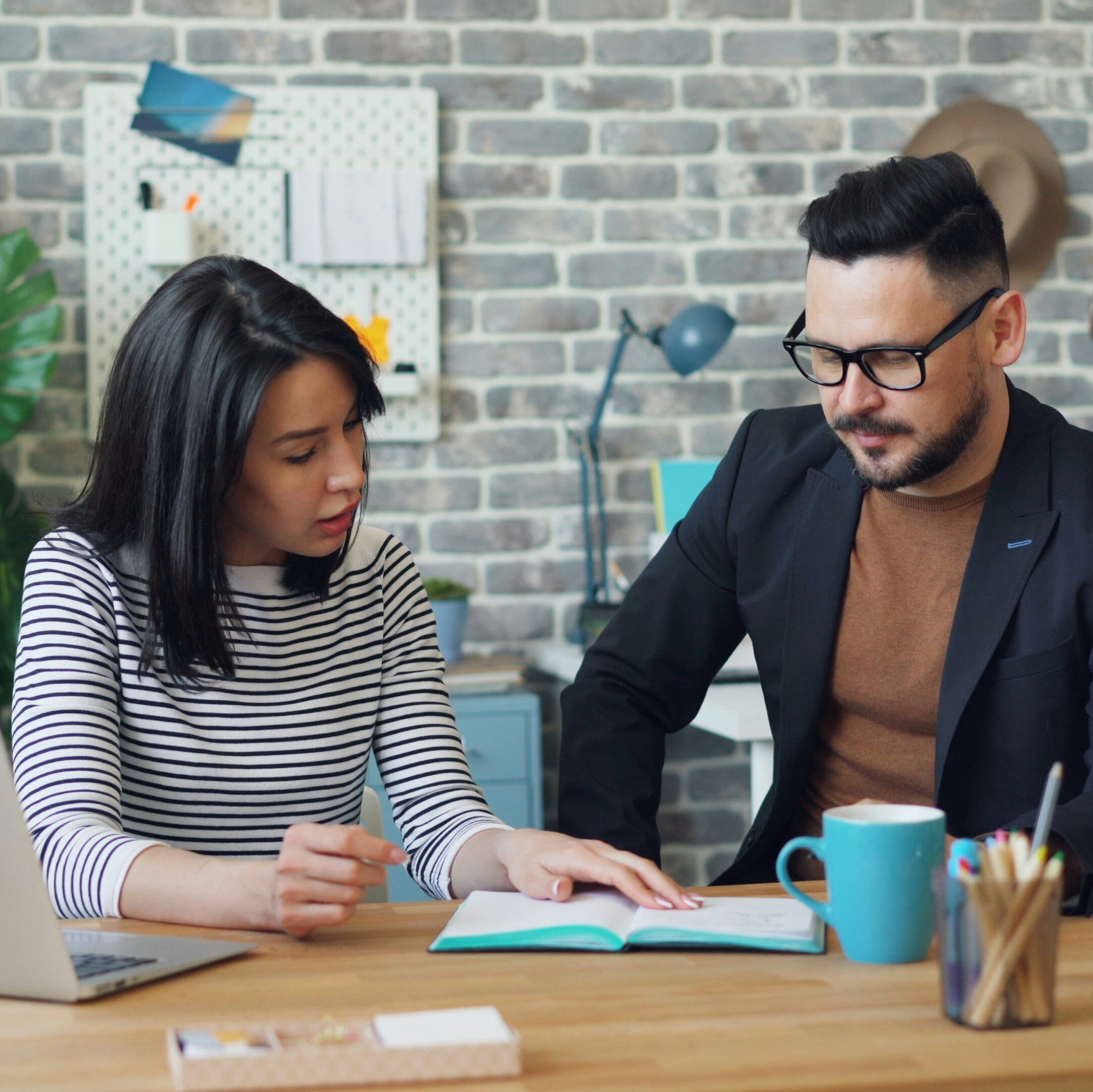 Professional speaking with a lawyer before a workplace investigation.