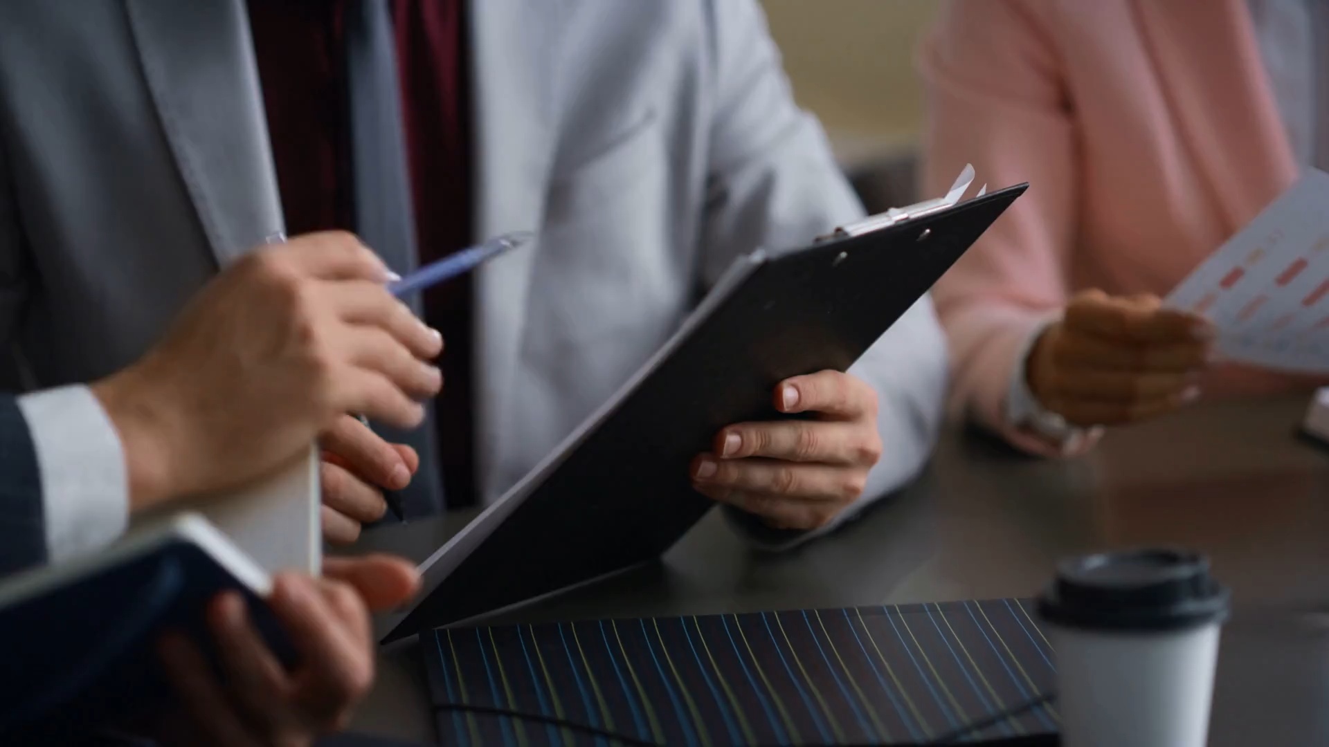 Lawyer reviewing forms with a client