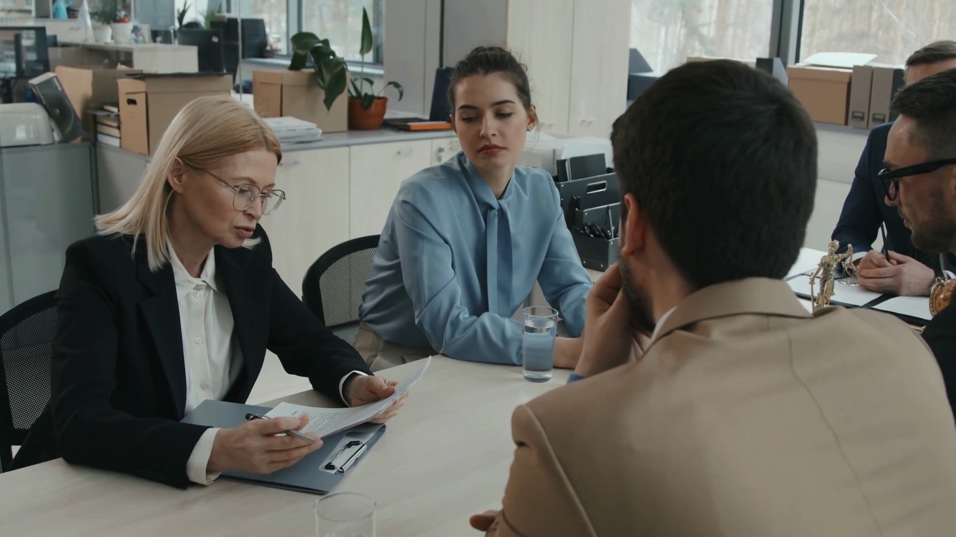 Lawyer team meeting with board members of an organization