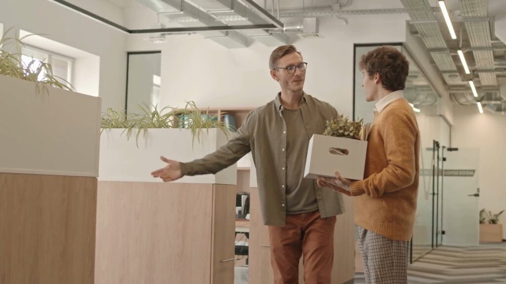 A new employee at their desk on their first day of work.